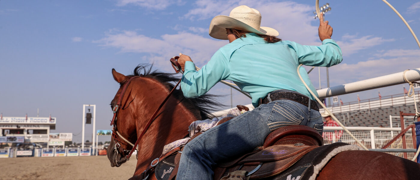 Macy Young blasts out of the box during slack at the Caldwell Night Rodeo.