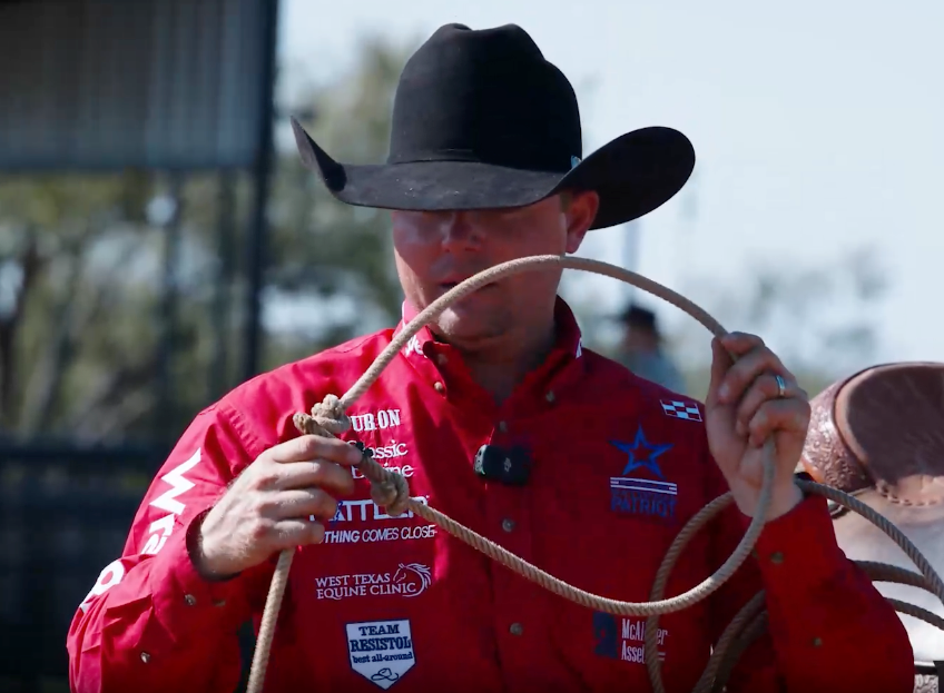 Logan Harkey demonstrates an average loop size for his knot rope.