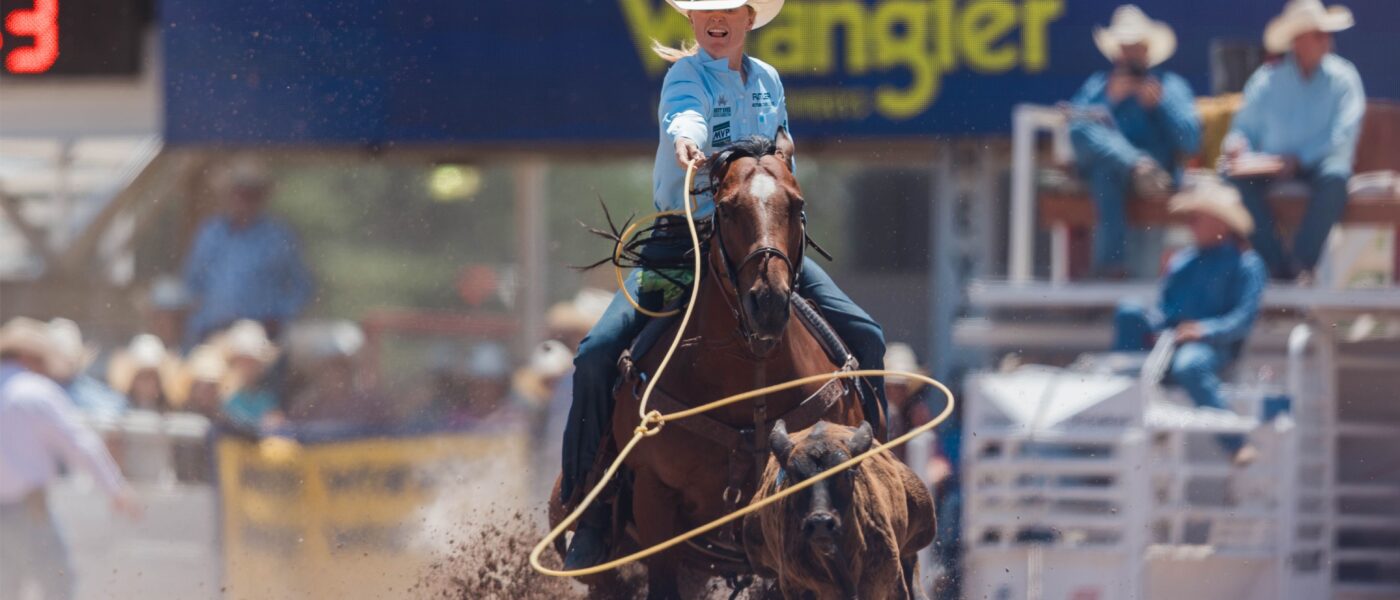 Rylee George and "Royce" knocking one down at the 2025 Cheyenne Frontier Days.