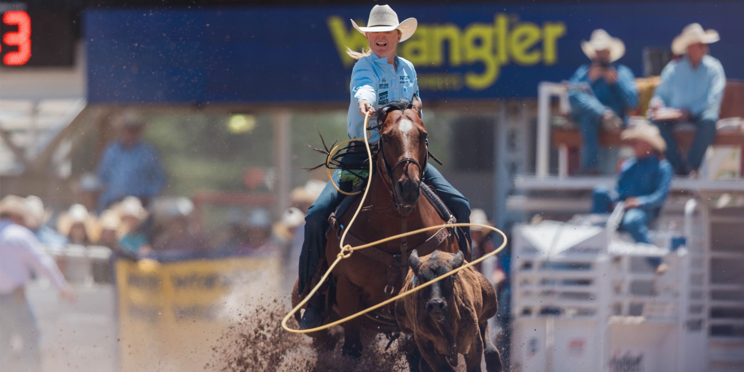 Rylee George and "Royce" knocking one down at the 2025 Cheyenne Frontier Days.