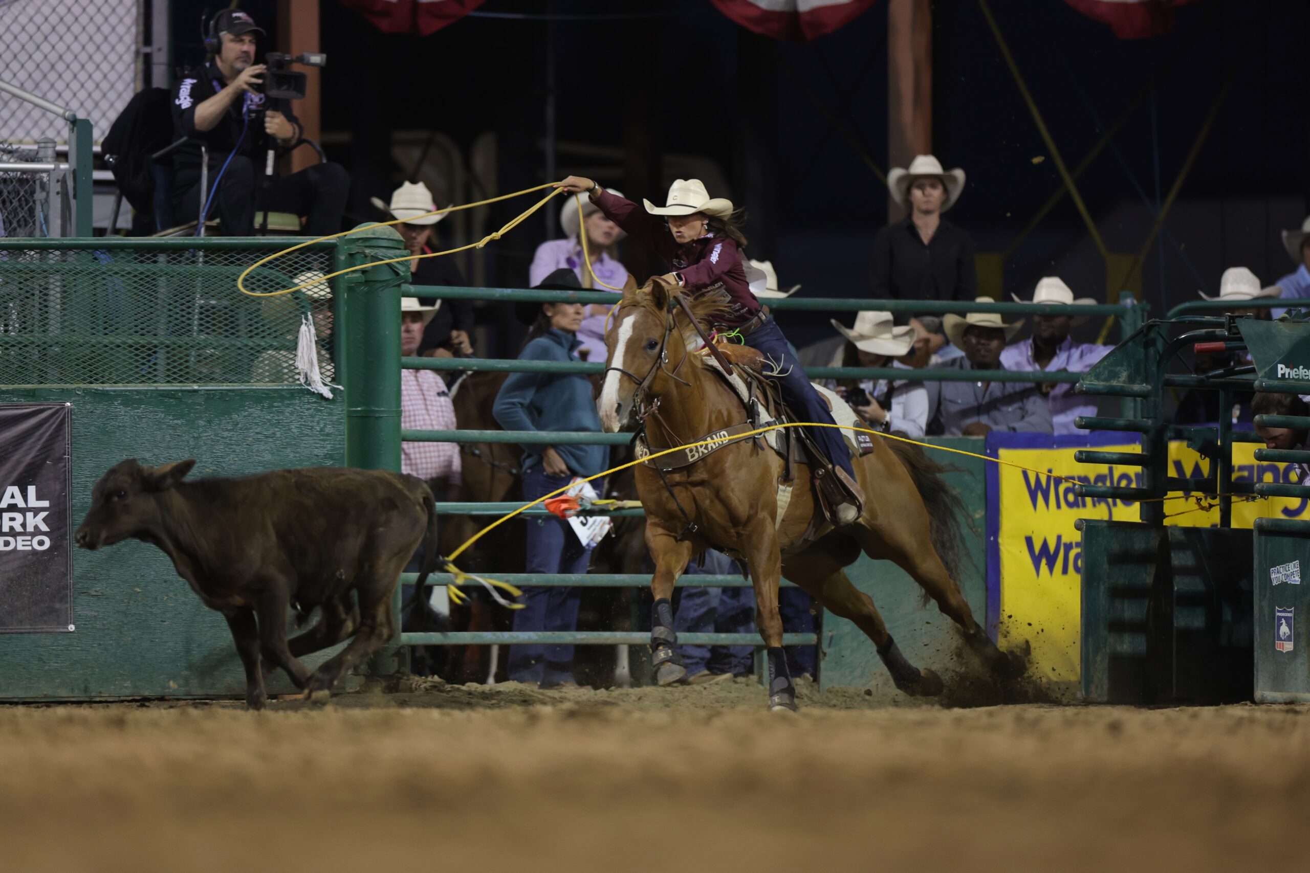 Rickie Engesser roping her calf in a perf at the Reno Rodeo 2026