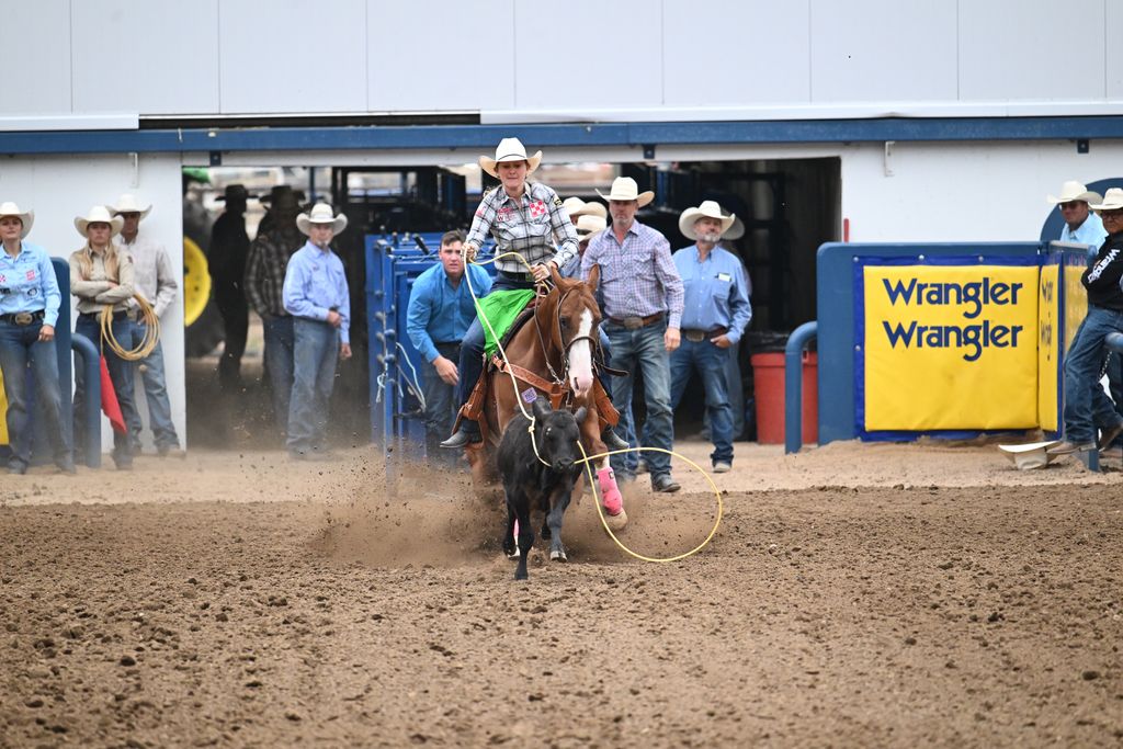 Jordi Edens-Mitchell roping her calf at the Greeley Stampede Slack 2026