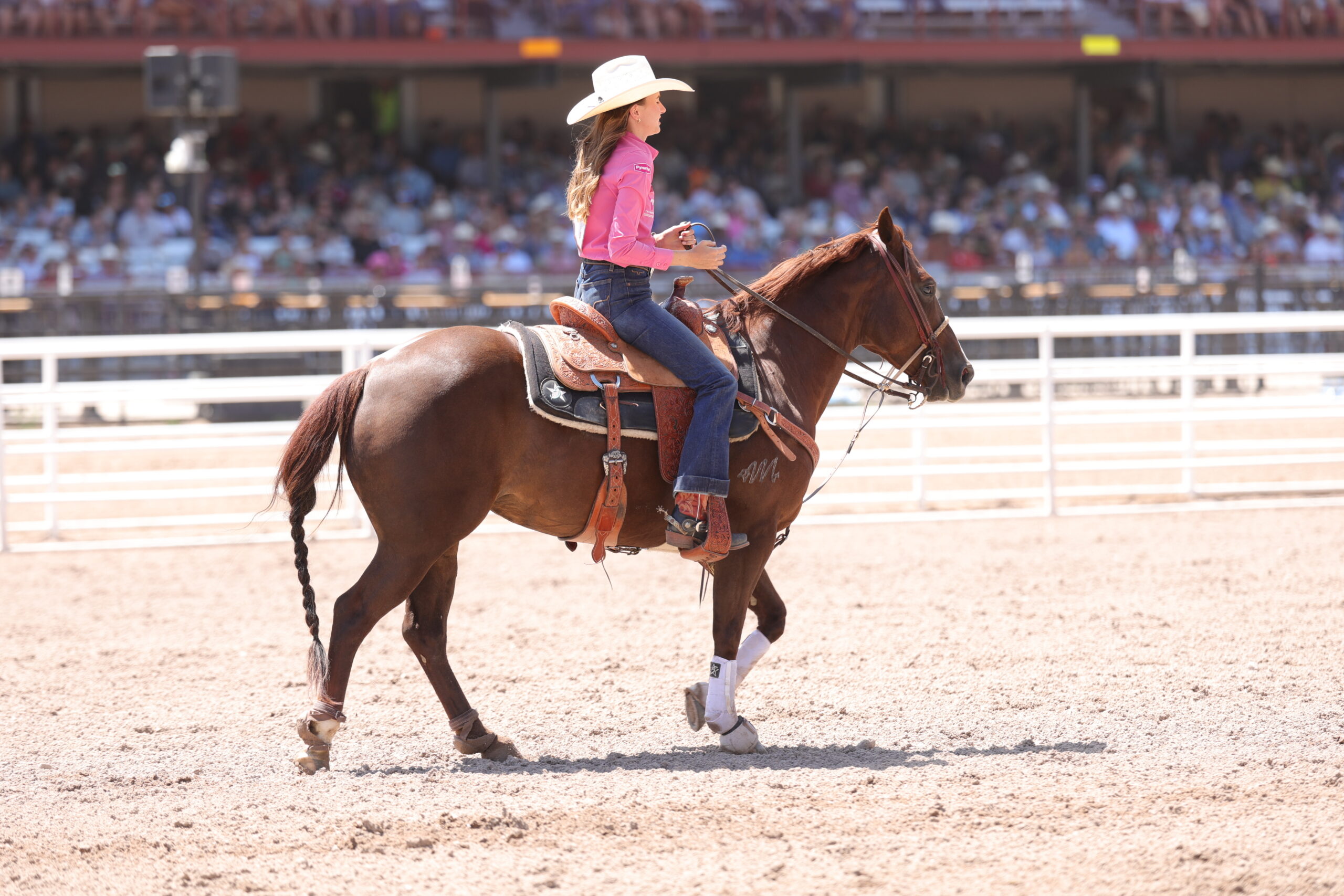 Josie Conner riding out of the arena after winning performance 4 at cheynne frontier days