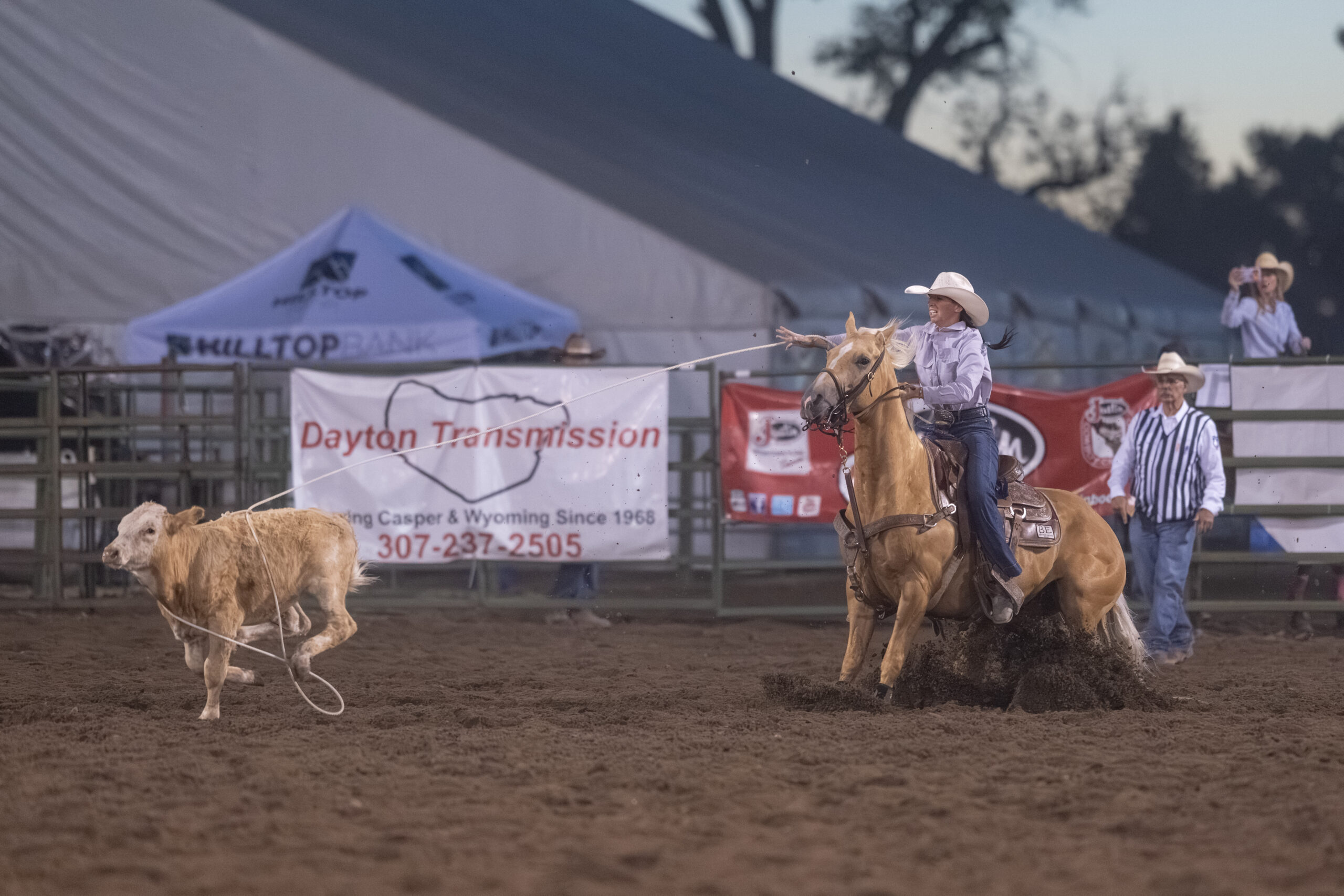 Kamie Jo Crouse pulling her slack after roping her calf at the Casper, Wyoming PRCA rodeo in 2026.