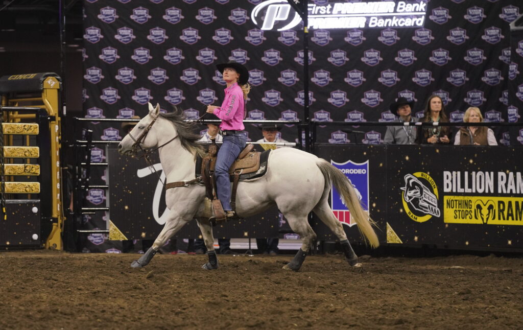 Breakaway roper Rylee George looks up at the scoreboard at the 2026 Governor’s Cup in Sioux Falls, South Dakota