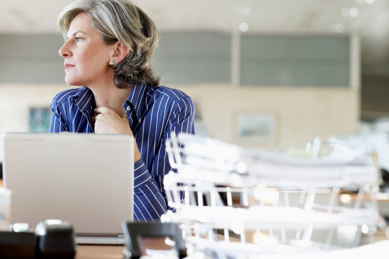 woman veterinarian working at computer