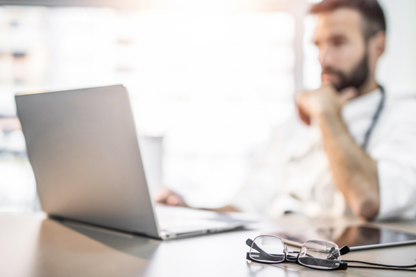 computer vet blurred in background iStock-DjelicS-960093670