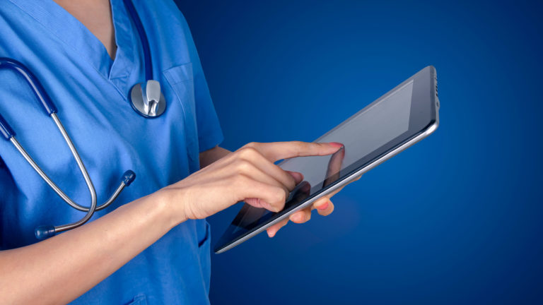 computer tablet veterinarian woman