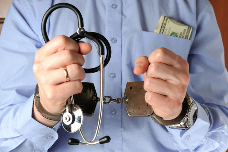 veterinarian man handcuffs money in pocket ethics ethical