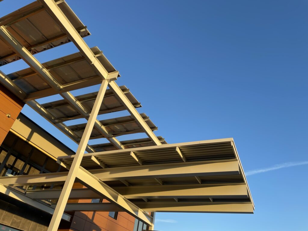 Here, we’ve integrated photovoltaic panels into a roof entry canopy in an Animal Arts project in Arizona. 