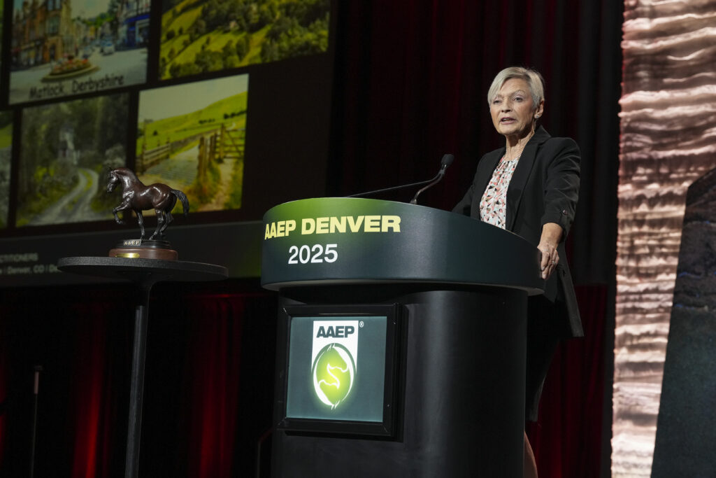 Dr. Hilary Clayton presenting the Milne Lecture at the 2025 AAEP Convention