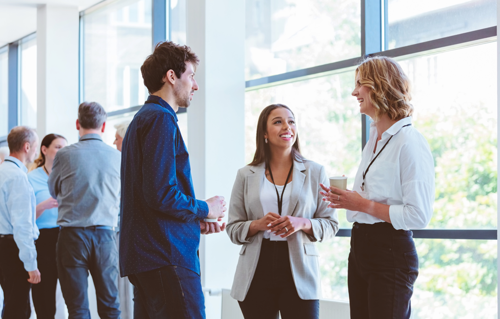 Professionals networking at a conference