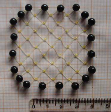 Handmade polyamide surgical mesh.
