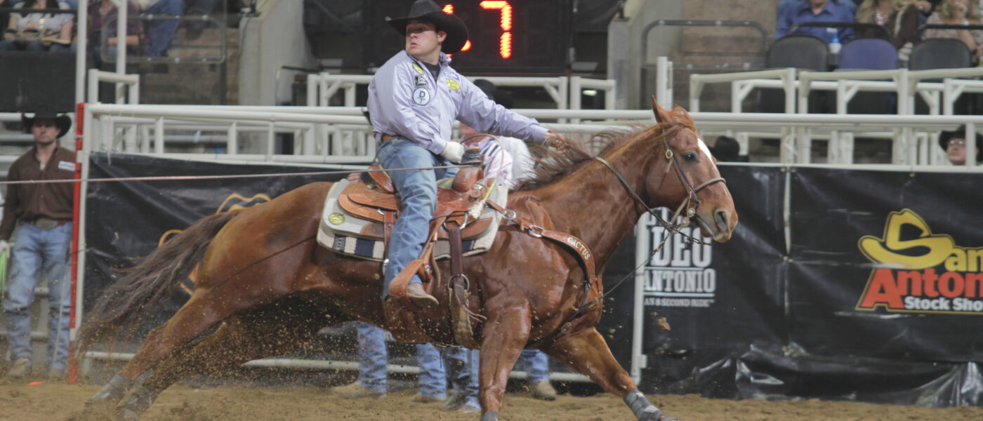 Kaleb Driggers turning a steer for Jade Cornell at the 2012 San Antonio Stock Show and Rodeo.