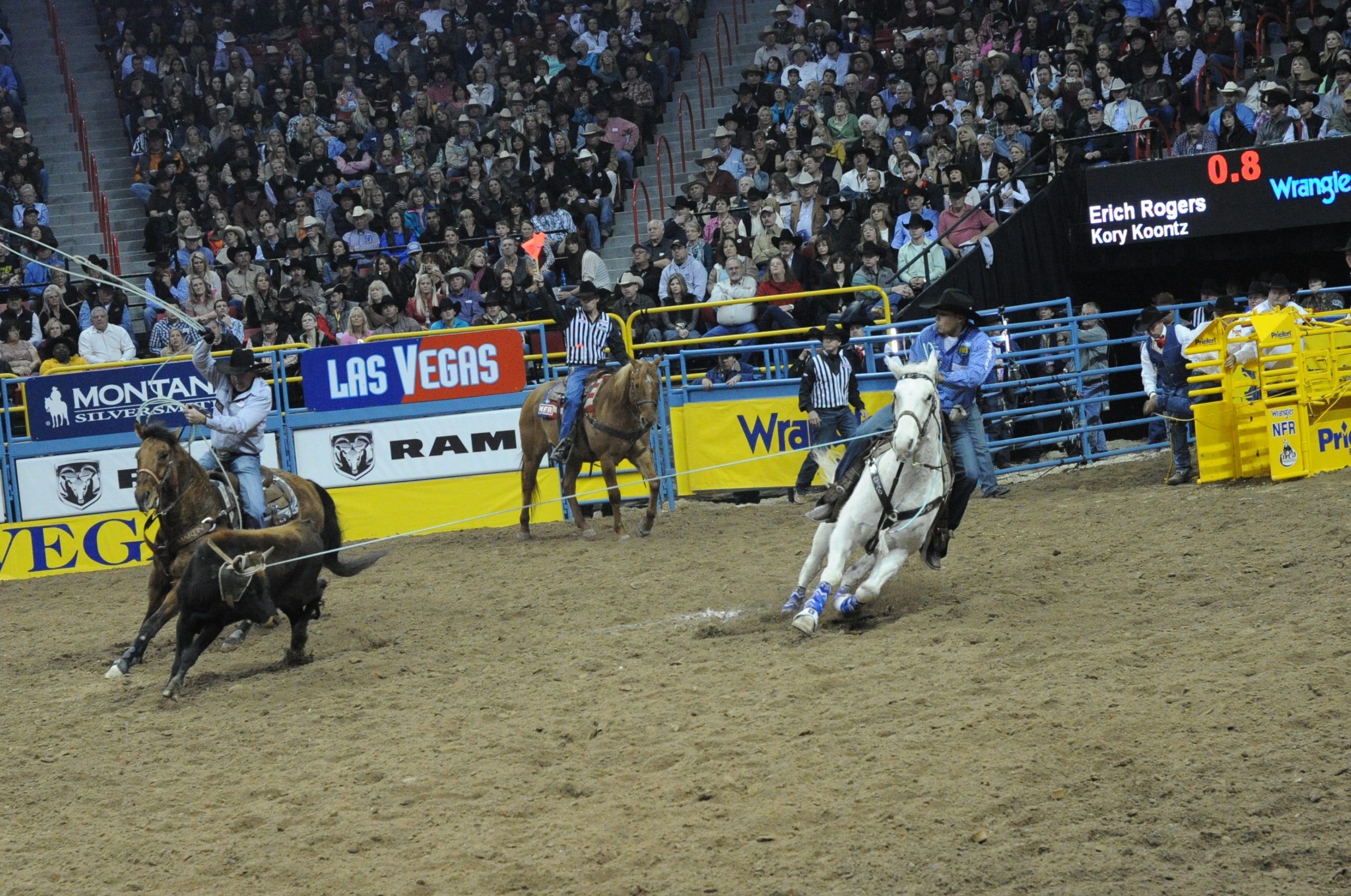 Erich Rogers turning a steer for Kory Koontz at the 2012 NFR.