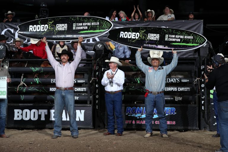 Quisto Lopez and Daniel Braman with their surfboards after winning the 2022 WCRA Rodeo Corpus Christi.