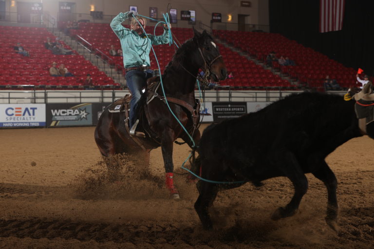 Jessy heeling for Bev Robbins at the 2021 Women’s Rodeo World Championship