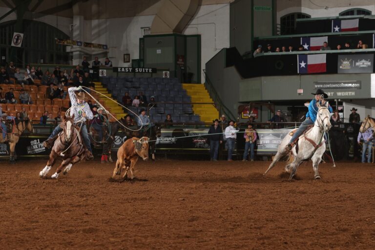 Clay Smith and Jake Long team roping at WCRA Cowtown Christmas.