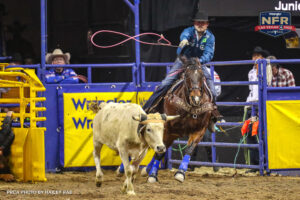 Kaleb Driggers throwing rope at steer