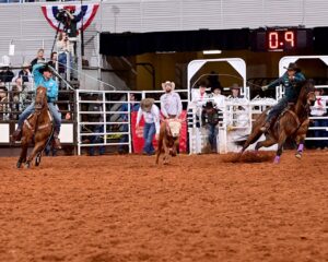 Andrew Ward and Buddy Hawkins team roping at Fort Worth Stock Show & Rodeo.