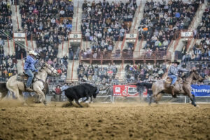 Zane Kilgus and Drew Carnes team roping at the 2022 FFCF.