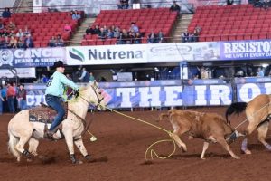 Clay Clayman ropes the heels during the 2023 Jr Ironman competition