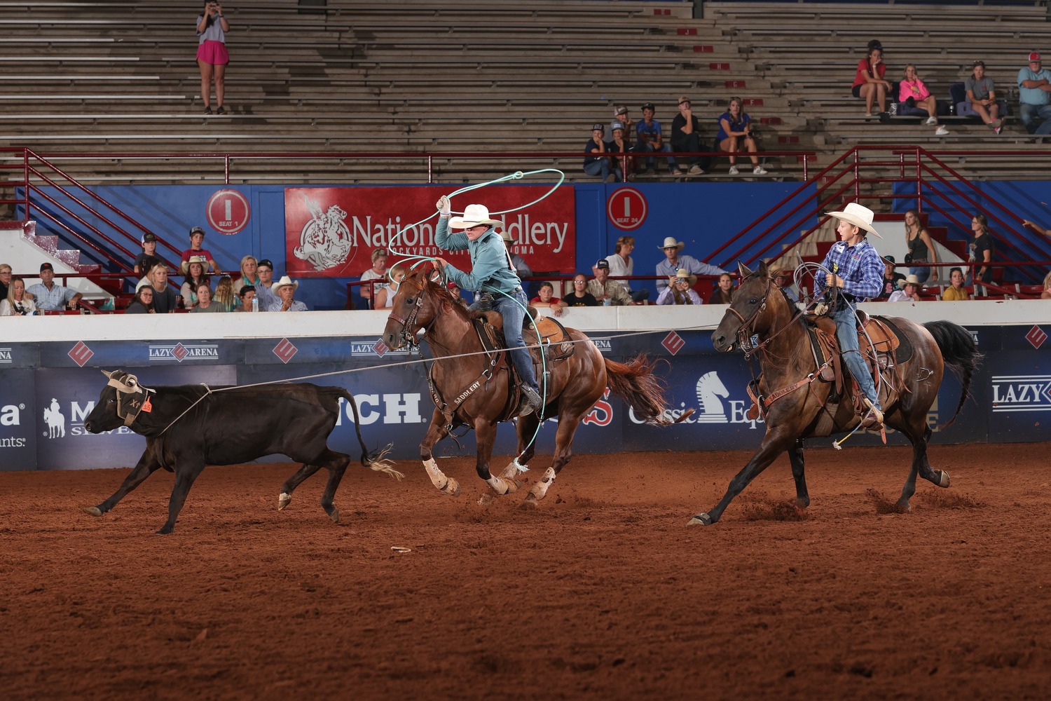 Bronc Evans and Brant Cookston team roping at the 2023 Cinch World Championship Junior Rodeo.