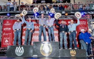 Brenten Hall and Paden Bray pose with their gold medals for winning the 2023 Utah Days of ’47 Rodeo.