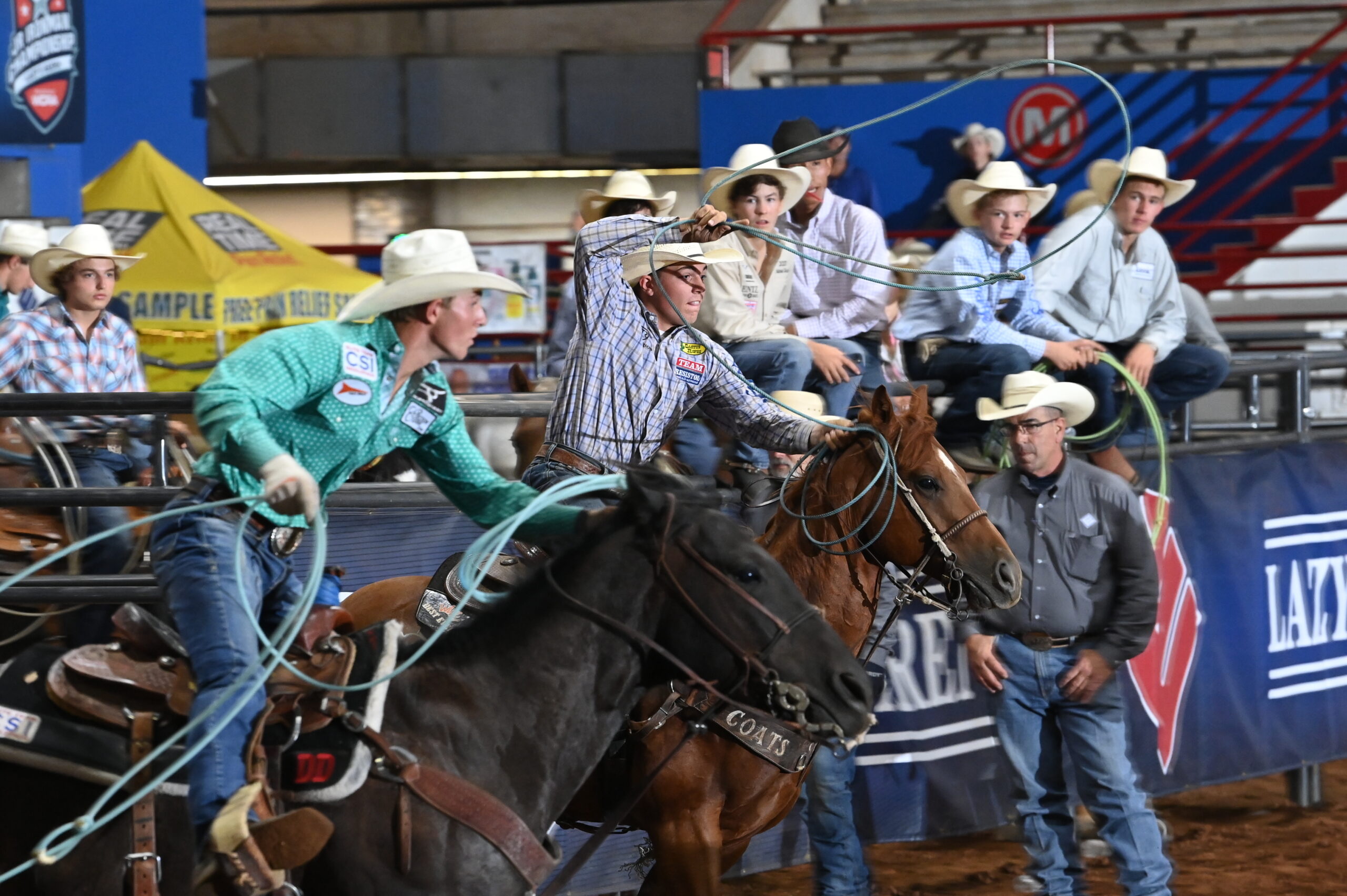 Ketch Kelton riding out of the box to head his steer.