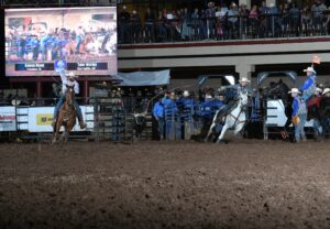 Nelson Wyatt turning a steer for Tyler Worley in the shootout round at the 2023 NFR Open.