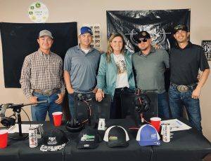 standing shoulder to shoulder behind a table: 2022 PRCA Rookie of the Year Junior Zambrano, Brandon Brown, Cowgirl Hall of Famer Lari Dee Guy, Brandon Shelton and nine-time NFR heeler Cesar de la Cruz.