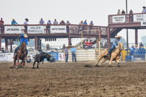 Dawson Graham turning a steer for his brother Dillon in Kennewick 2023.