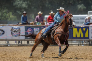 Julie Harvey heading a steer at the 2023 California's Richest All-Girl Breakaway & Team Roping.