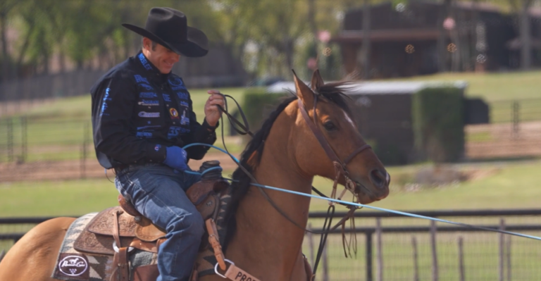 team roper Patrick Smith heeling for Tanner Tomlinson during practice session