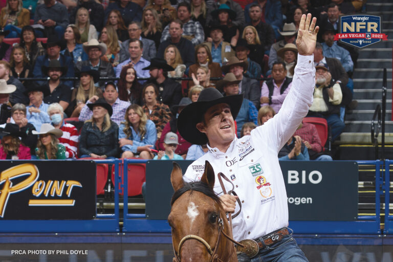 Patrick Smith waves to the crowd at the 2022 NFR in Las Vegas, Nevada.