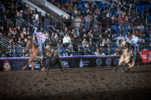 Jon Peterson heading a steer for Trae Smith at the 2023 Badlands Circuit Finals.