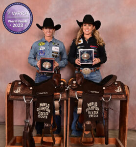 Jackie Crawford and Annette Stahl pose with their championship saddles.