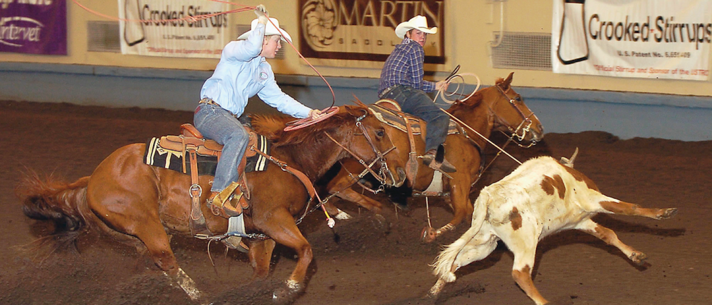 Brady and Riley Minor team roping at the 2004 US Open.