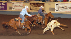 Brady and Riley Minor team roping at the 2004 US Open.