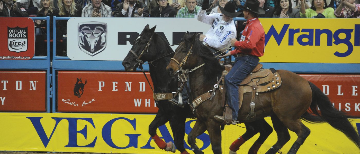 Chad Masters and Champ celebrating another winning run at the 2012 NFR.