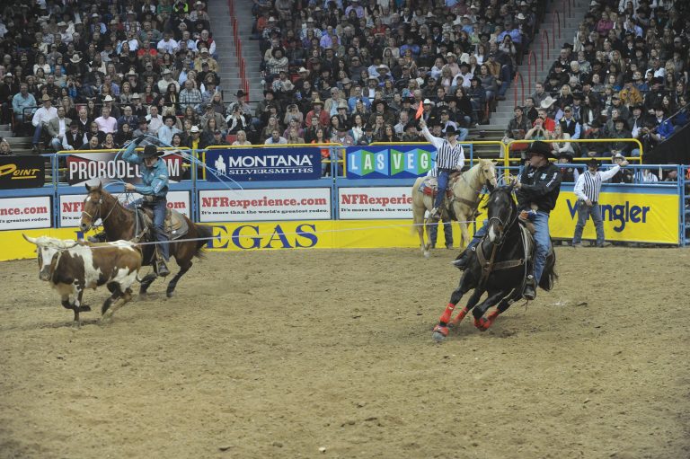 Trevor Brazile riding Pine Time Boogie at the 2013 NFR.