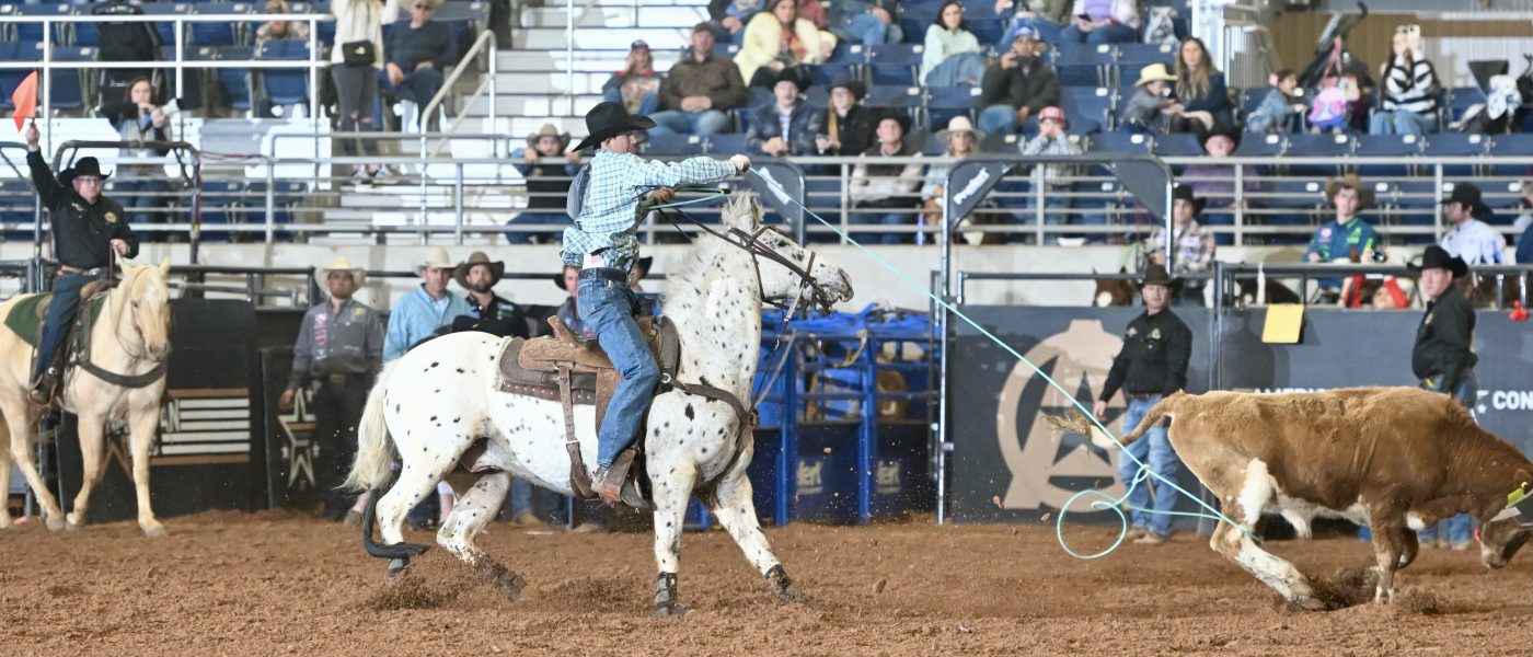 Nicky Northcott hammering one on Apache behind Clay Smith to secure a spot at The American, where they’ll rope for $1 million on March 9. | Click Thompson Photo Courtesy of Teton Ridge