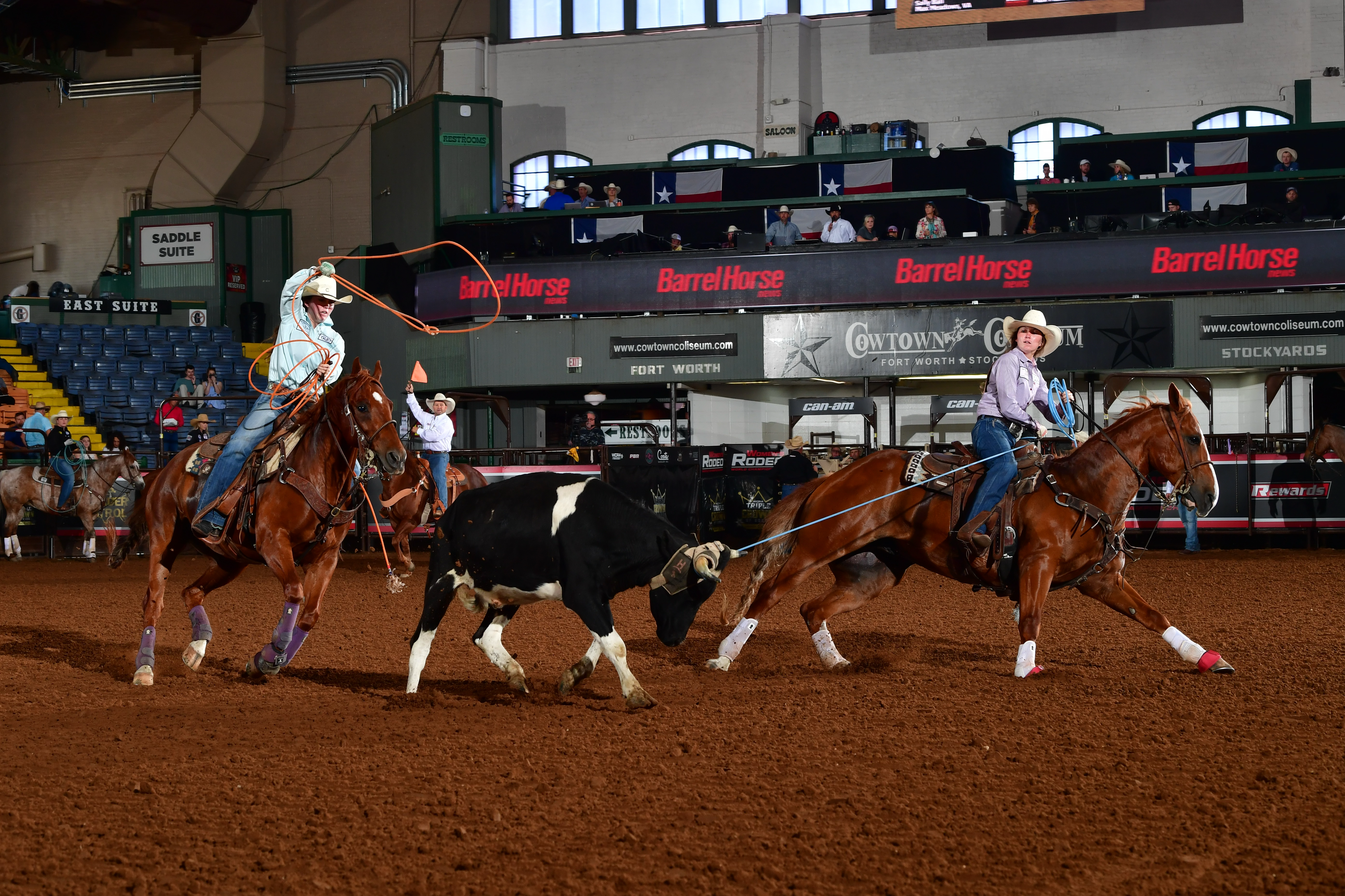 Sydney Ball heading a steer for her twin sister at the 2023 WRWC.