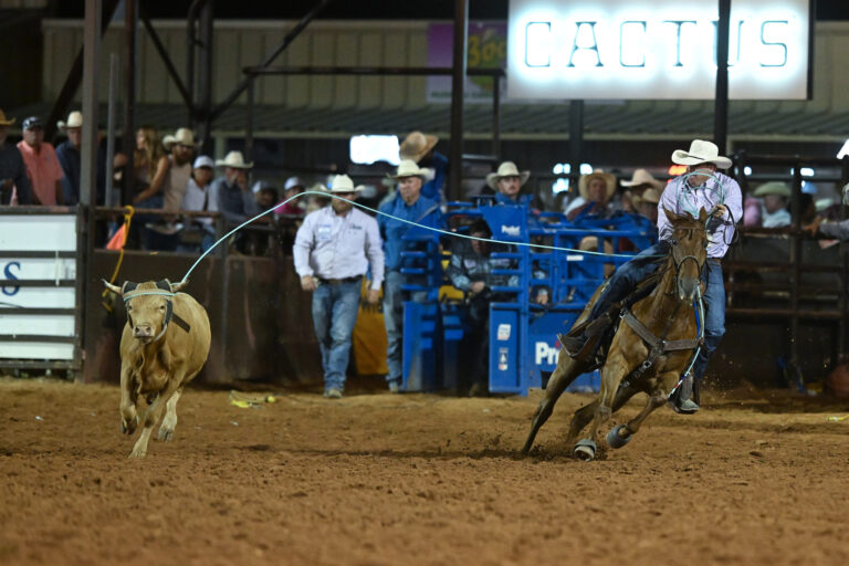 Cory Kidd heading a steer for Dustin Davis in Weatherford.