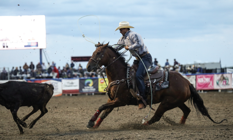 Dillon Graham heeling a steer on his first stringer Cruze.