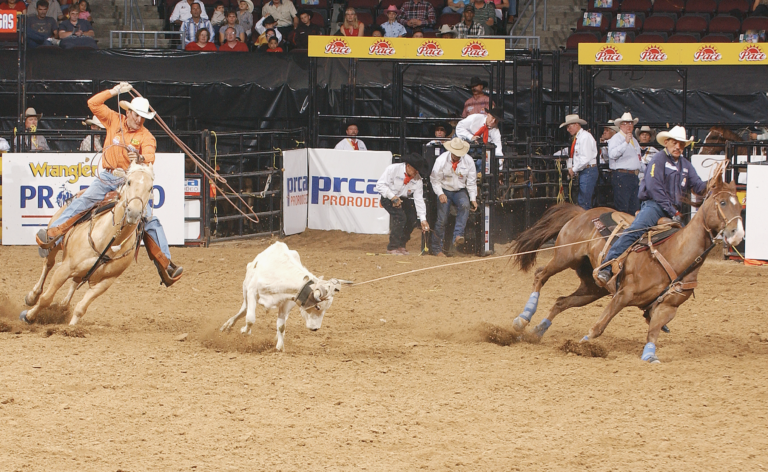 Tee Woolman and Kirt Jones team roping at the ProRodeo Tour Finale in 2004.