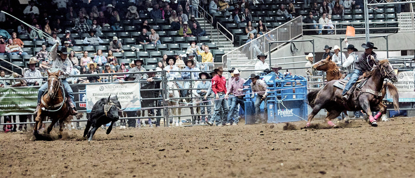 Riley minor heading a steer for Brady Minor at the 2024 Columbia River Circuit Finals.