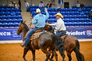 Justin Pruitt and Tommy Zuniga celebrating after their win.