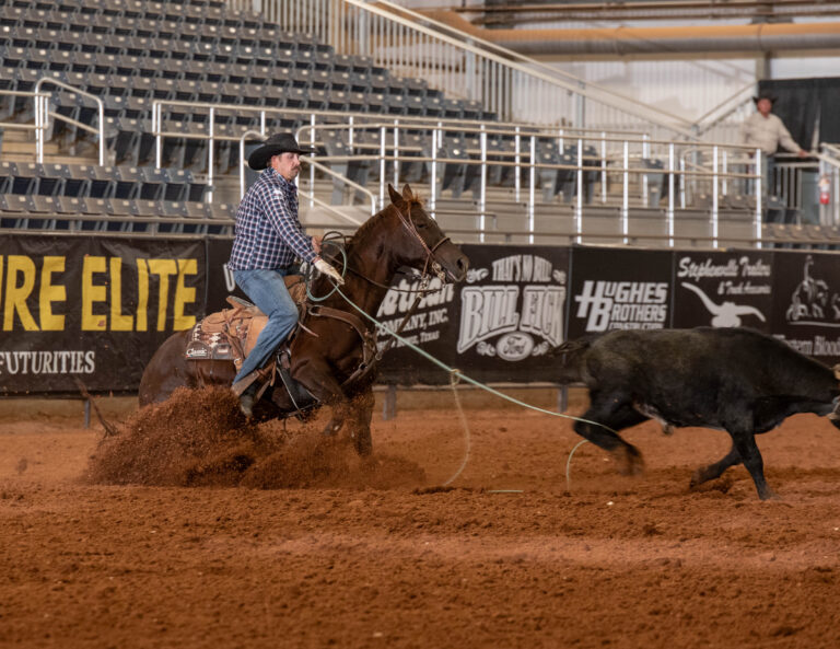 Jeremy Buhler heeling on SLR Swinging Hickory, the highest-earning futurity mare in rope horse history