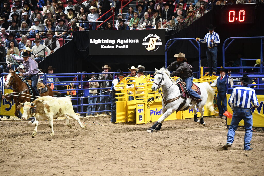 NFR Round 1 Team Roping Lightning Aguilera